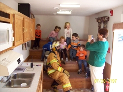 Kids Learning from a Fire Fighter